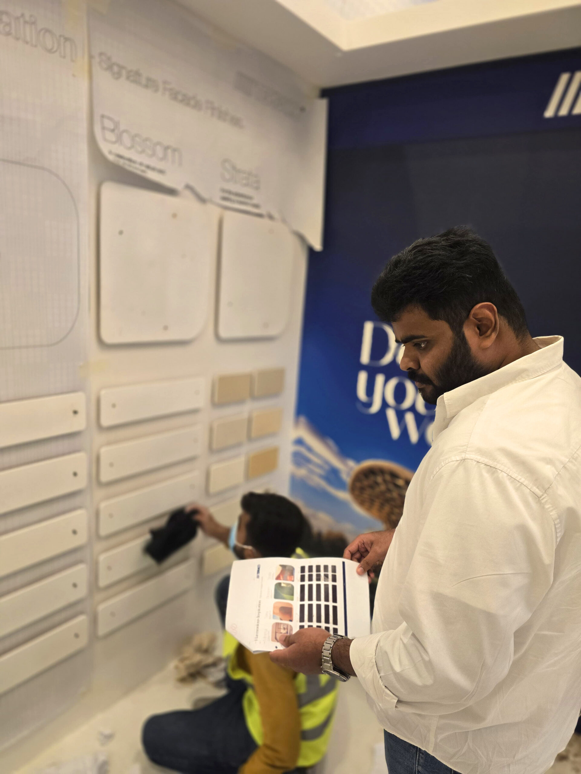 Athul Iyju Jacob working on the Terraco's Exhibition booth in Dubai